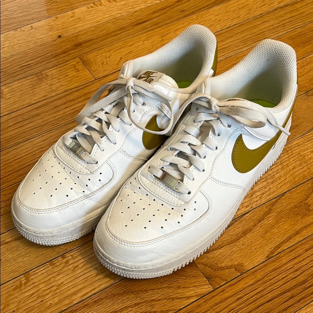 Nike Air Force 1 ‘07 Next Nature White Sneakers with Gold Accents